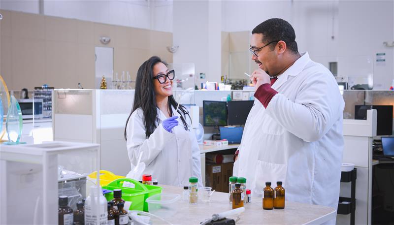 Food scientists collaborating in a lab